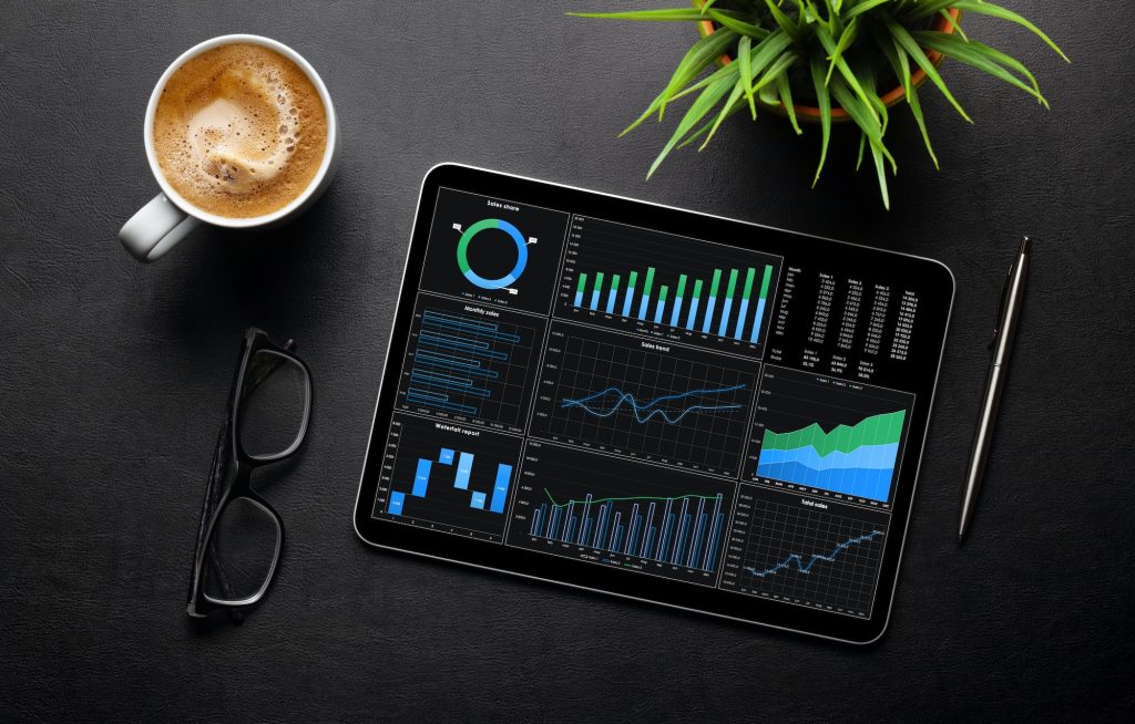 Tablet with business reports and charts